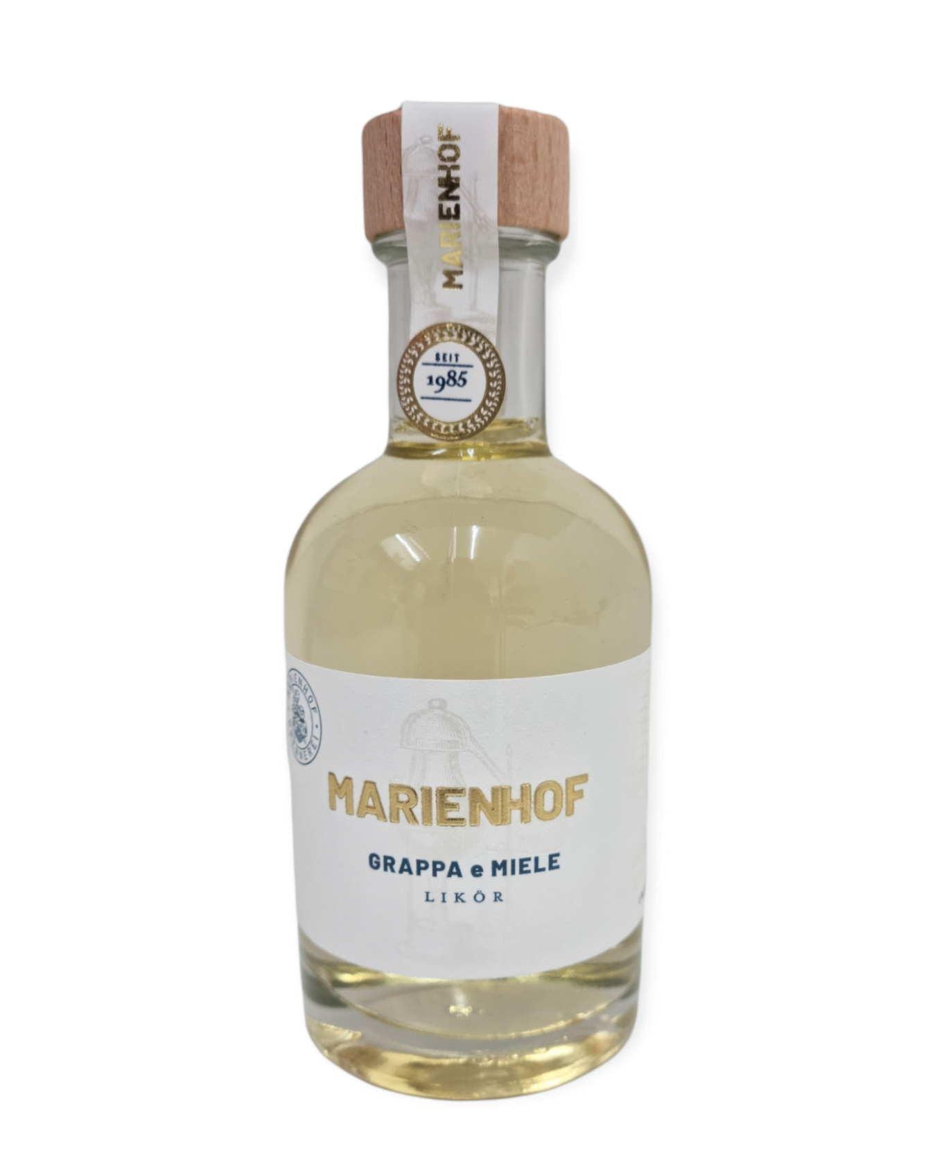 Runde helle Flasche gefüllt mit Grappa mit Honig Spirituose